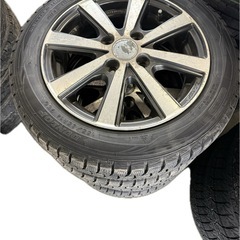 155/65/14スタッドレスタイヤとアルミホイールの画像