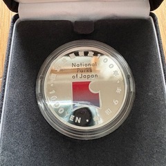 国立公園制度100周年記念千円銀貨の画像