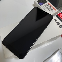 docomo　SC-02L (SIMロック解除済)+ 手帳型カバー + ガラスフィルムの画像