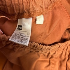 オレンジ　ズボンの画像