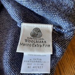 LACOSTE ネイビー メリノウールニットセーターの画像