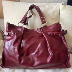 赤 カバン バッグの画像