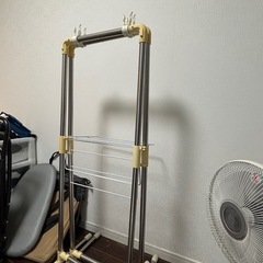 ニトリ　物干し竿を置くラックの画像