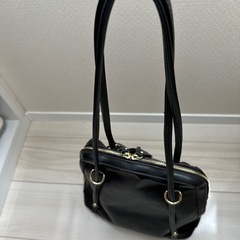 黒リュックの画像