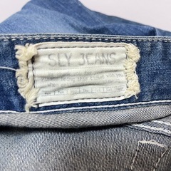 デニムパンツ ブルー ダメージ加工の画像