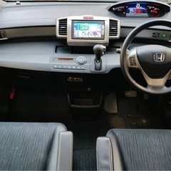 フリードスパイクハイブリッド　車検１０年１月　ジャストセレクションプラス　デジＴＶ・ナビ・バックカメラ・両側パワースラの画像