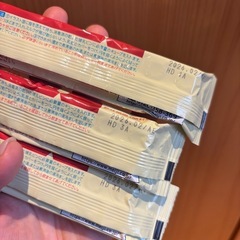 授乳クッションとミルク(ほほえみ)の画像