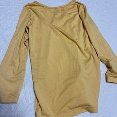 UNIQLO ヒートテック　130サイズ　山吹色の画像