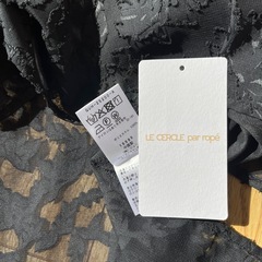 新品レディース黒ブラウスの画像