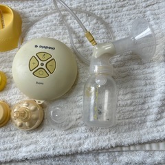 medela電動搾乳機、手絞り搾乳機、ピジョン哺乳瓶消毒ケースの画像