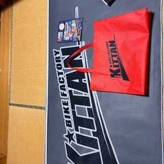 バイクKITTAN のロゴ絨毯の画像