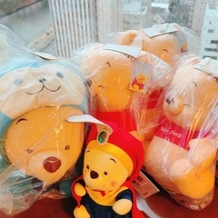 新品未使用袋入りディズニーツムツムプーさんぬいぐるみ8個の画像