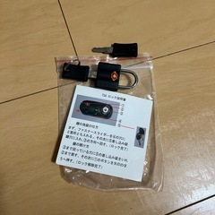 キャリーケース黒　ピンク　ハートの画像