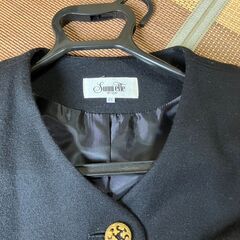 黒いコートの画像