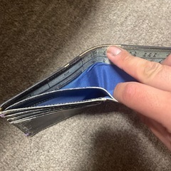 TOMMYの財布あまり見ないデザインですの画像