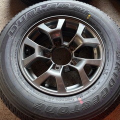 新車外し スズキ ジムニーノマド純正アルミホイール夏タイヤセット 15×5.5J 5H139.7PCD+5 BS DULER H/L 195/80R15 4本 9.9分山 JB74シエラの画像