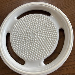 器つきのおろし器の画像