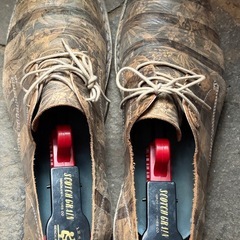 ディーゼルブラックゴールドの革靴の画像