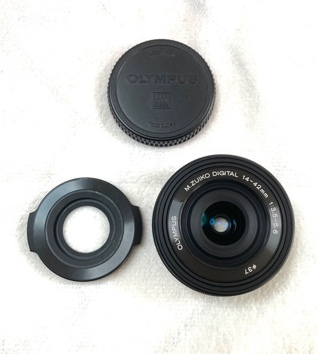 値下げ・［美品]M.ZUIKO 14-42mm 電動ズーム+自動開閉シャッター式キャップ