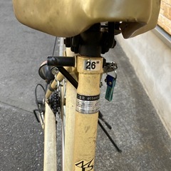26インチ　黄　自転車の画像