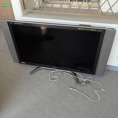 テレビ2台と照明２つの画像