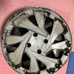 トヨタアクア純正ホイールキャップ14インチ
の画像