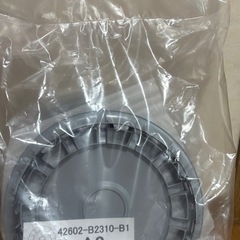 新品未開封14インチ ダイハツ 純正 ムーヴキャンバス ホイールカバー 4個セット 42602-B2310-B1 A3 の画像