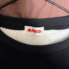 黒のトレーナーの画像