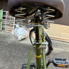 受け渡しお話し中　自転車の画像