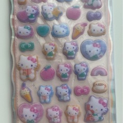 正規品サンリオキャラクターズ、ハピダンブイ、キティのコットンパフィシール3枚セットの画像