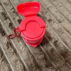 ガチャガチャ コインケースと明太かねふくの画像