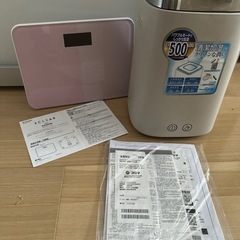引越整理中 加湿器と体重計の画像