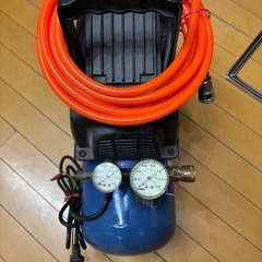 お取引決定しました。アネスト岩田　エアーコンプレッサー　新品ホース付きの画像