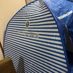 テントと折りたたみイスの画像