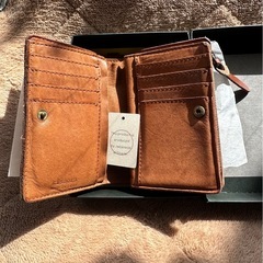 キソラレザー二つ折り財布の画像