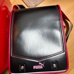 PUMA ランドセル　赤黒の画像