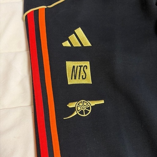 adidas NTS ジャージパンツ 黒/オレンジ