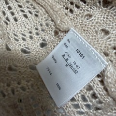 ベージュ カーディガンの画像