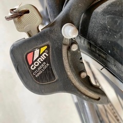 3月中引き渡し希望　丸石サイクル　ネイビーとライムのシティサイクル、バスケット付き鍵ありの画像