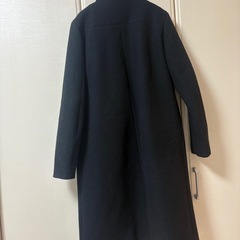 黒 コートの画像
