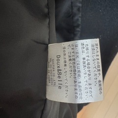 黒 コートの画像