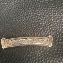 ノーブランド 黒いショルダーバッグタガー装飾付きの画像