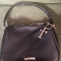 ノーブランド 黒いショルダーバッグタガー装飾付きの画像