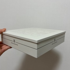 Henri Charpentier の四角い缶の画像