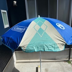 コールマン（coleman）パラソルとスタンドとスクリューペグセット
の画像