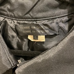 コムコムのトレンチコートの画像