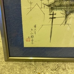 アルミフレームと絵の画像