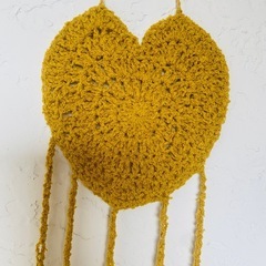 ハート型の編み物 壁掛け装飾の画像