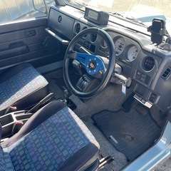 🉐【支払い総額45万円】車検令和9年10月17日　H9年1月　スズキ　ジムニー　ランドベンチャー　4WD リフトアップ　パイプバンパー　社外MOMOステアリング調子良好！の画像