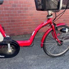 Panasonic赤い電動アシスト自転車 シティタイプ 前バスケット付きの画像